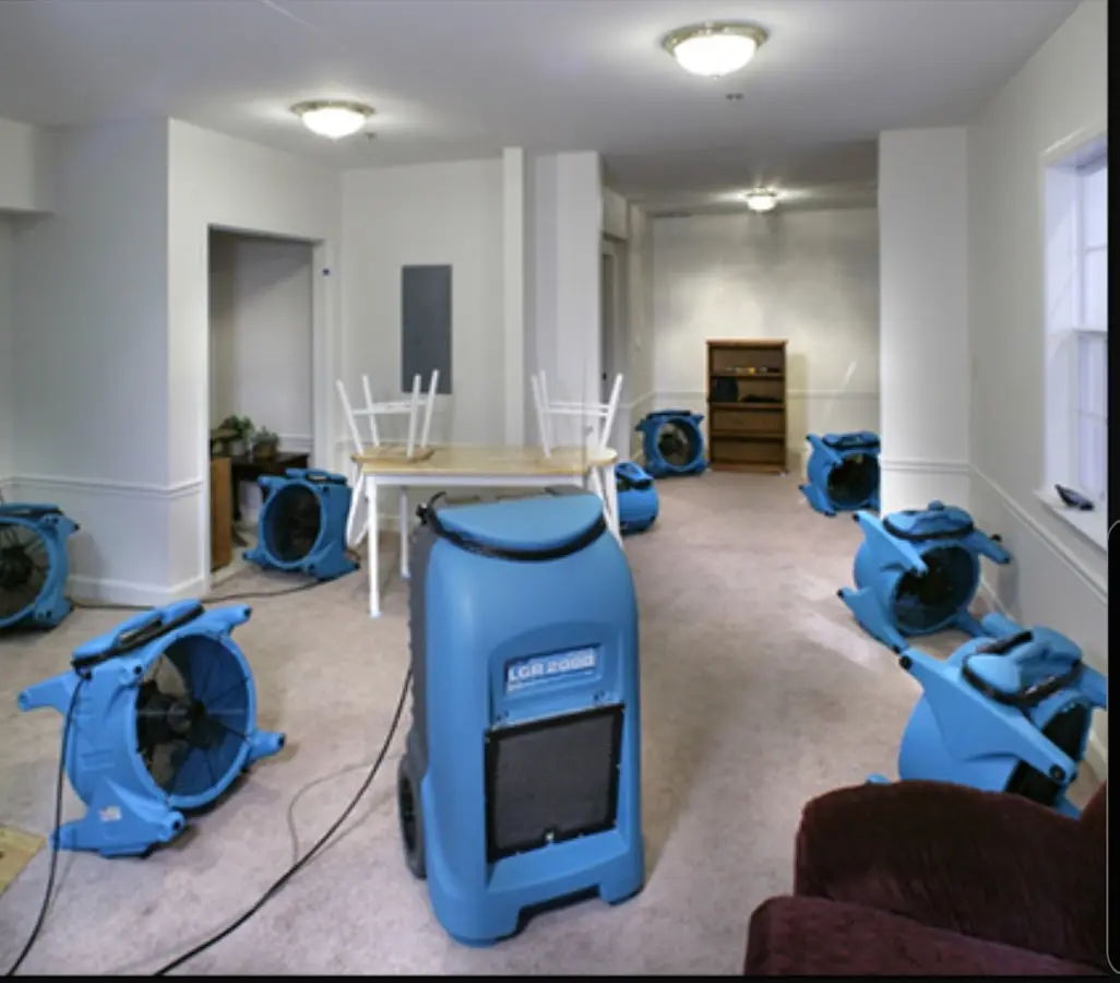 Air movers and dehumidifier setup for Water Damage Restoration in Hanover